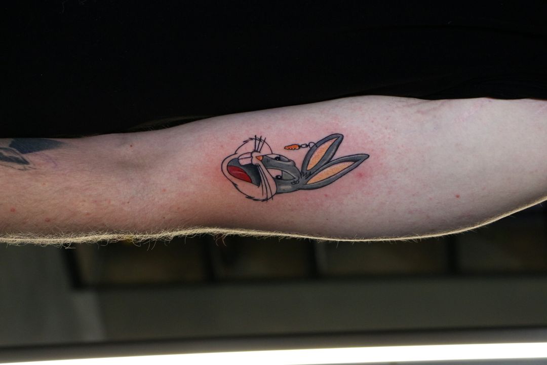 Color Bugs Bunny tattoo on forearm
