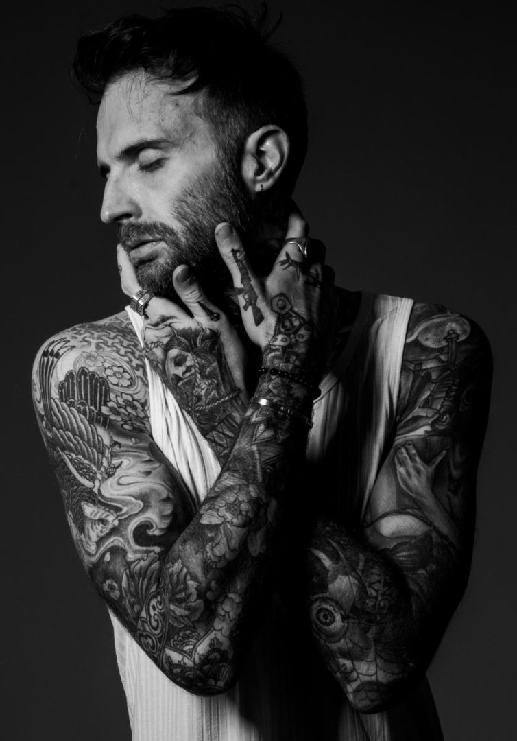 Tattooed male model with blackwork tattoos